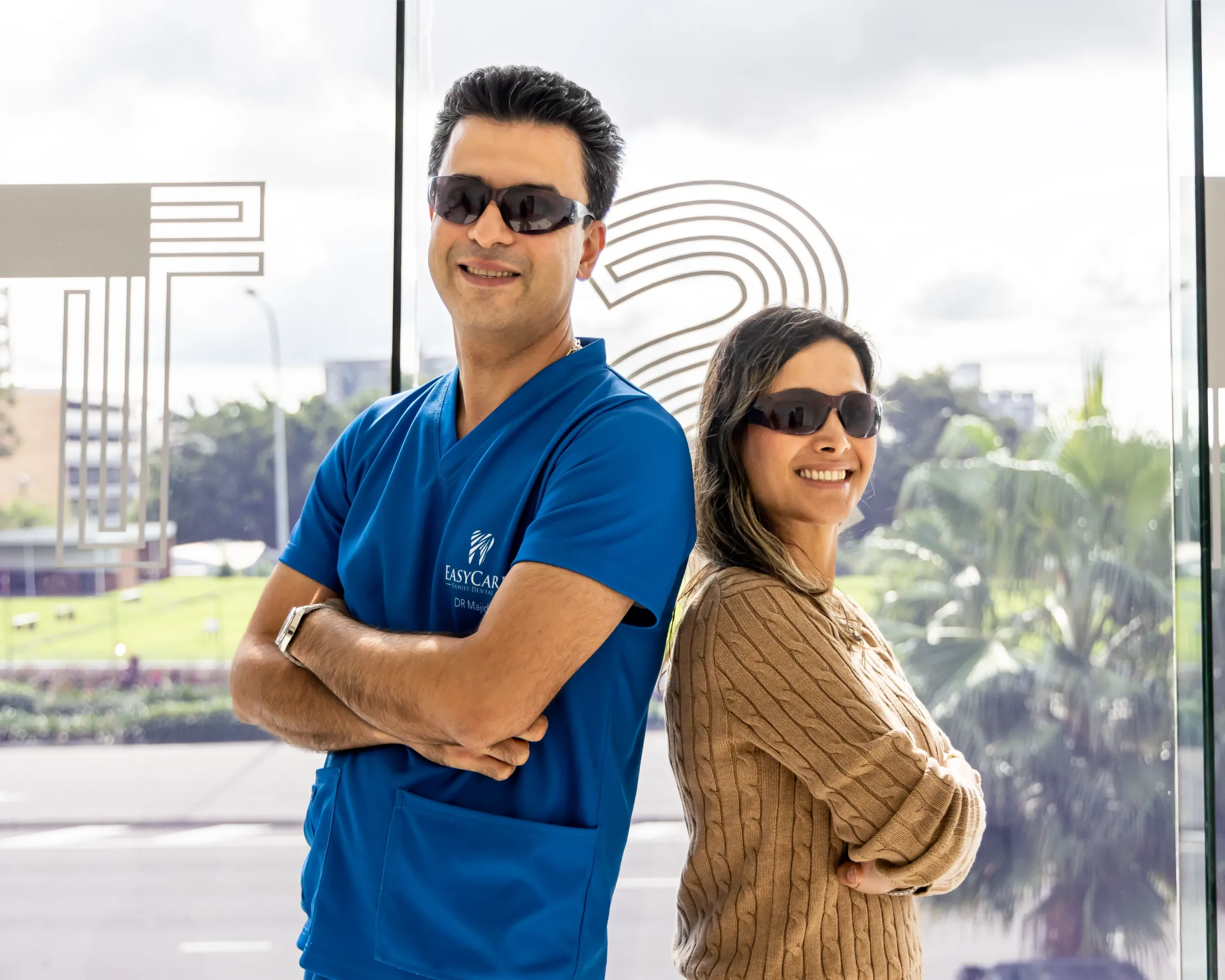 Dr Majid and Dr Sheyda enjoying a light-hearted moment at EasyCare Family Dental