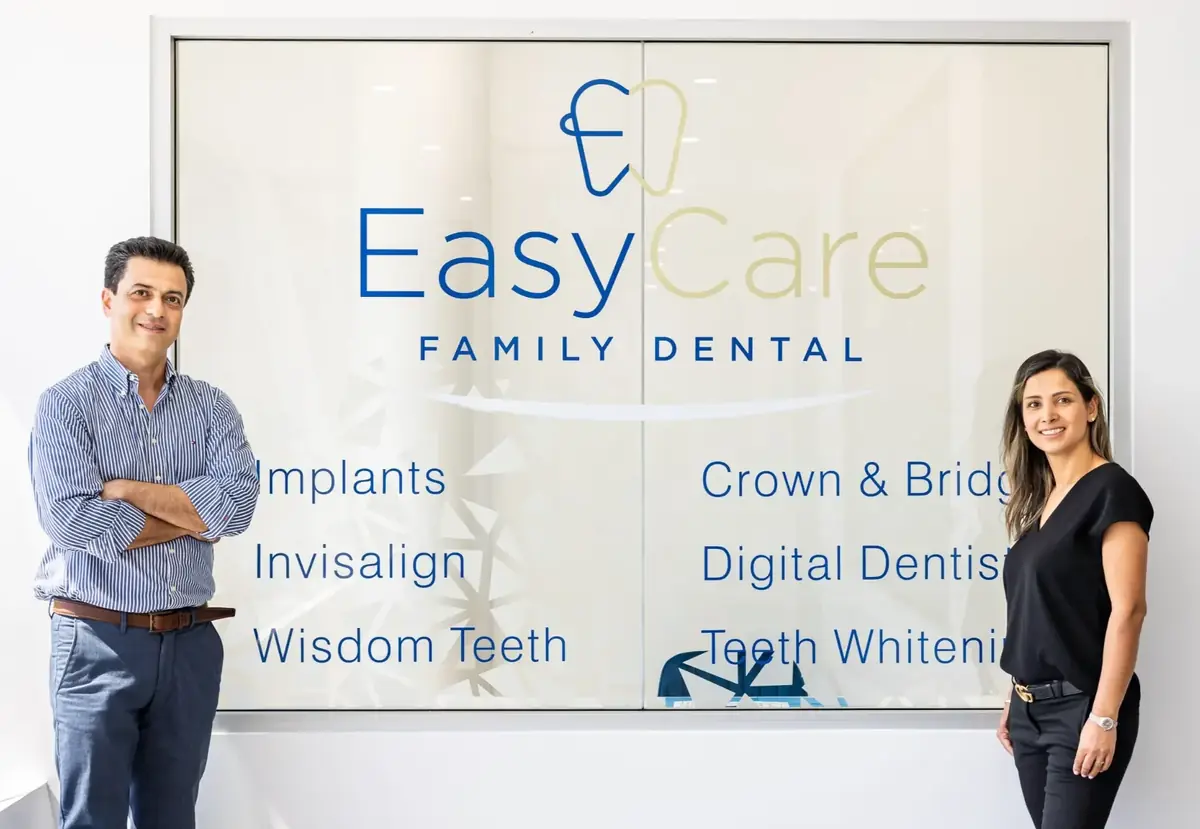 Dr Majid and Dr Sheyda welcoming patients to EasyCare Family Dental in East Brisbane