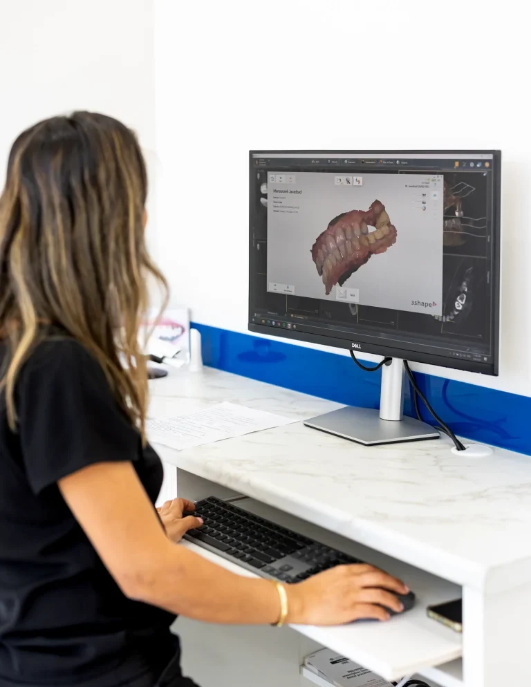 Dr Sheyda reviewing a digital dental model