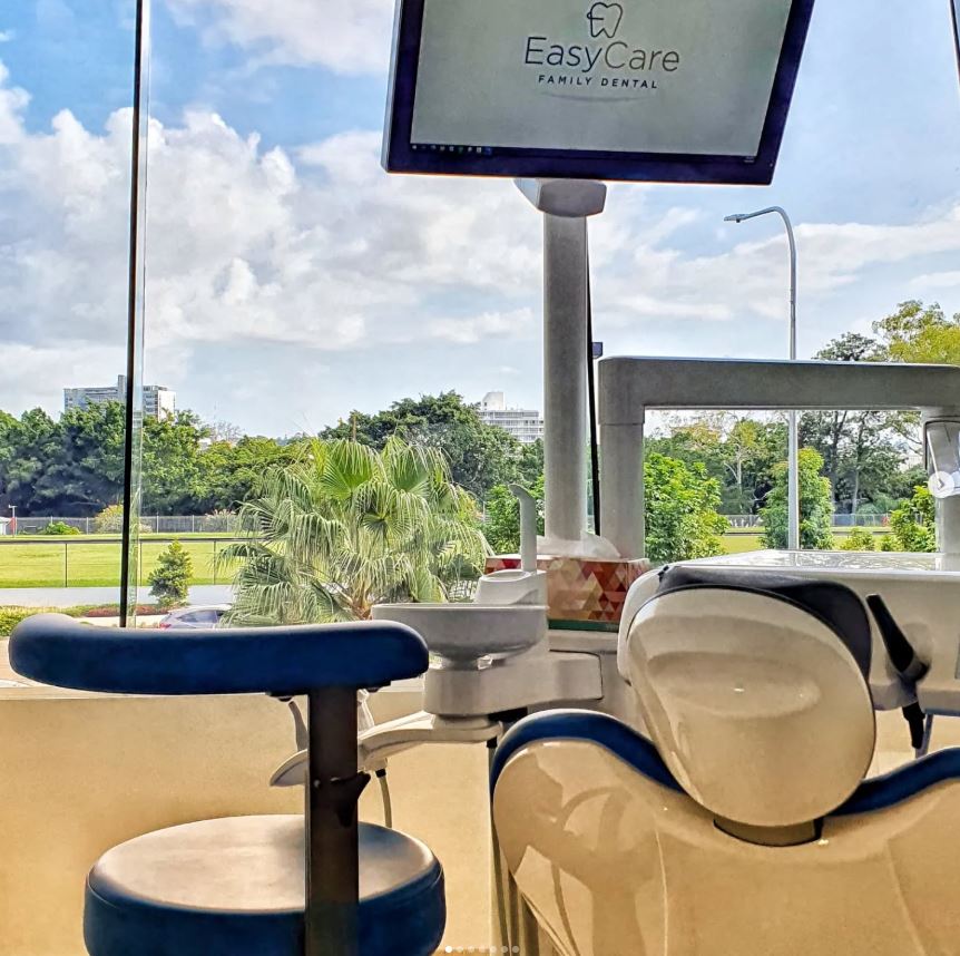 The original EasyCare treatment room photograph with a dental chair, natural light and green views across Mowbray Park